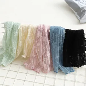 Detailed shot of breathable floral lace sheer stack socks in multiple pastel and dark colors.