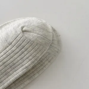 Close-up detail of grey ribbed knit sock, showing soft breathable fabric texture for daily wear.