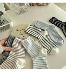 Comfortable striped mid-calf socks for women, stylish casual cotton hosiery daily wear.