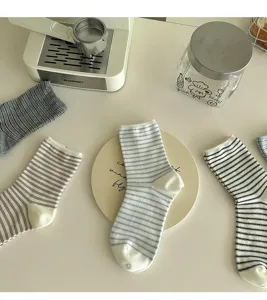 Striped mid-tube socks for women, classic casual slouch design, comfortable daily wear.