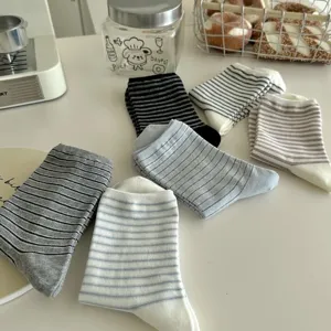Detailed close-up view of casual striped mid-calf socks set, soft breathable cotton knitwear.