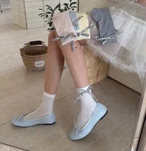 Spring summer women floral bow mid tube socks with sweet mary jane flat shoes detailed shot.