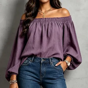 Detail view of the purple off-the-shoulder long sleeve blouse with elastic gathered neckline.