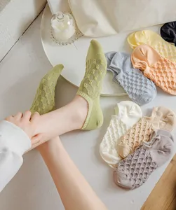 Detailed view of breathable mesh low cut women socks in multiple candy colors lifestyle