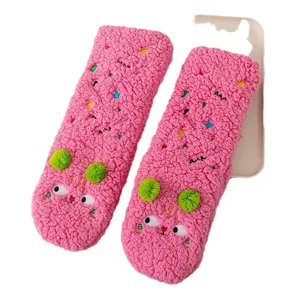 Thick plush lamb fleece floor socks for women, cute cartoon embroidery design for cozy winter wear.