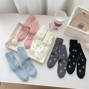 Detailed view of trendy star patterned ribbed mid-tube socks in versatile colors for women.