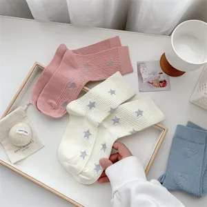 Women mid-tube ribbed socks with cute star patterns, casual daily wear, comfortable knit socks.