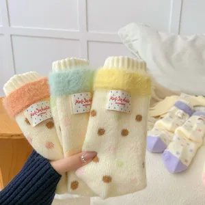 Thickened dot yarn cute fluffy plush warm mid-tube socks detail view showing cozy winter wear options.