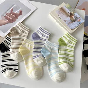 Detailed view of cute Japanese style striped women low cut boat socks in multiple colors.