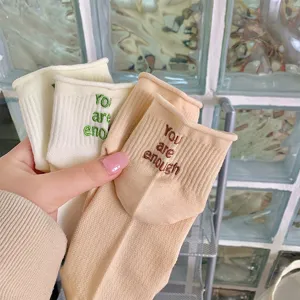 Cute Japanese style women ankle socks with ruffle cuff and sweet embroidery detail