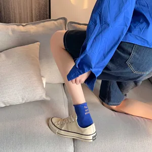 Comfortable blue short socks for women, stylish daily wear soft cotton hosiery product.