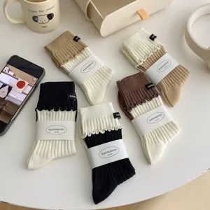 Korean style sweet ruffled lace socks, cute cotton stackable socks with brand labels for daily wear.