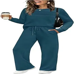Detail view of a stylish teal long sleeve lounge set, comfortable two-piece outfit.