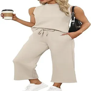 Women summer casual knit sleeveless top and wide leg cropped pants two piece set beige outfit.