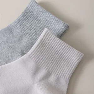 Detailed shot of cotton men low cut socks, ribbed cuff texture view, soft casual style.