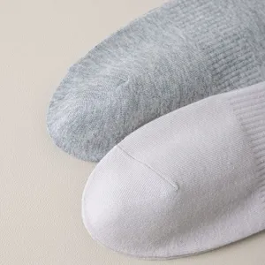 Mens cotton short socks detail view showing fine knit texture and breathable fabric.