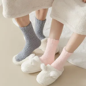 Cozy coral fleece winter socks for women, thick warm fuzzy crew socks for indoor home floor sleeping.