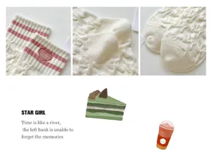 Cute women's mid-calf knit socks with pink stripes and delicate heart embroidery for spring style.
