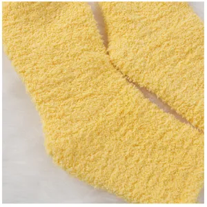 Solid color coral fleece sleep socks, cozy fluffy mid-calf winter socks for women.