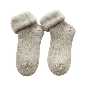 Thick winter fleece wool socks for women, cozy thermal snow socks with plush cuffs main display.