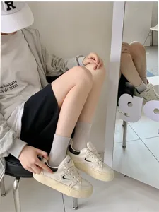 Cute Japanese style white mid-tube socks for women, trendy spring and summer thin design.