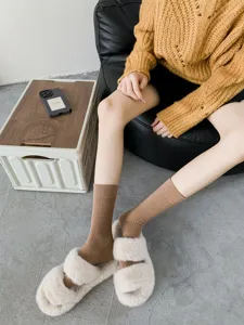 Comfortable ribbed mid-calf socks for women, stylish daily wear, soft and breathable fabric.
