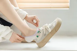 Women's summer mesh low-cut boat socks breathable invisible socks with floral embroidery detail.