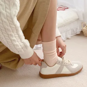 Cute Japanese style women crew socks, soft cream stripe knit design for comfortable summer wear.