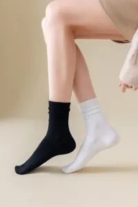 Cotton mid-calf ribbed socks in black and white, casual daily wear for spring and summer.