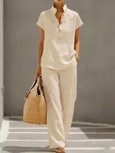 Casual solid color linen-style short sleeve top and long pants outfit detail showcase.