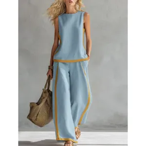 Completo estivo da donna senza maniche con pantaloni larghi a contrasto outfit casual e chic