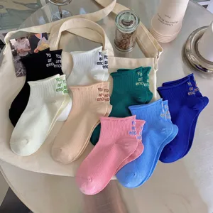 Cute women ankle socks with motivational letter print, stylish short cotton socks for daily wear.