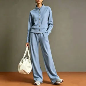 Solid color stand collar cardigan sweatshirt and wide leg pants tracksuit set for women.