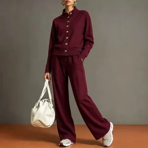 Detailed view of solid color stand collar cardigan sweatshirt and wide leg pants set.