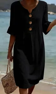 Detailed view of casual black V-neck midi dress with buttons for women resort wear