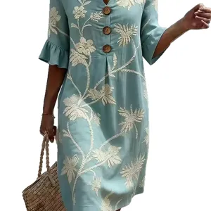 Casual resort style V-neck midi dress with white floral embroidery and half sleeves for women.