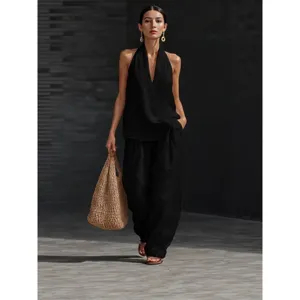Women summer casual two-piece set featuring sleeveless loose halter top and wide leg pants chic