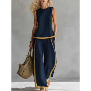 Completo estivo chic senza maniche con top a contrasto e pantaloni larghi da donna.