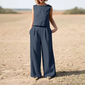 Completo donna tinta unita in lino con top smanicato e pantaloni larghi vista principale