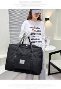 Large capacity waterproof travel duffel bag for clothes quilt storage, black durable material.