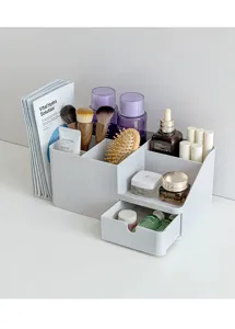 Organizer da scrivania bianco in plastica con scomparti multipli e comodo cassetto per ordine.