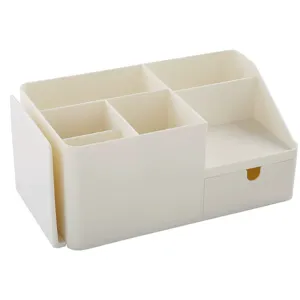 Organizer da scrivania in plastica bianca con scomparti, cassetto e fermalibri estensibile.