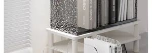 Clear acrylic desktop bookshelf and bookend for office and study organization. Detail view.