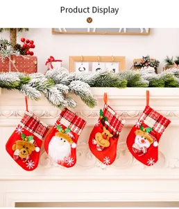 Christmas stockings hanging decor with cute plush bear santa reindeer snowman for holiday home party.