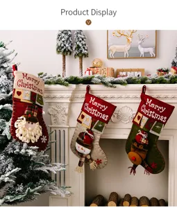 Detailed view of Christmas hanging stockings featuring 3D Santa snowman and reindeer designs.