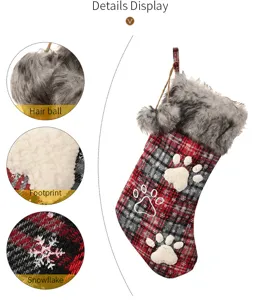 Red and black plaid Christmas pet stocking with fluffy faux fur and cute paw print design.