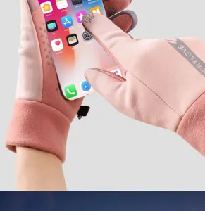 Detail shot of pink fleece-lined touchscreen cycling gloves showing fingertips and grip.