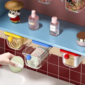 Under-shelf storage drawer punch-free clear organizer box for bathroom cotton pads and swabs.