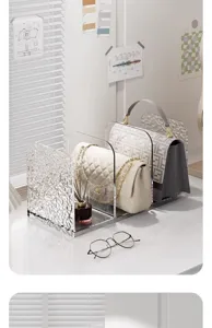 Clear acrylic desktop organizer bookend for office desk book and file storage shelf detail.