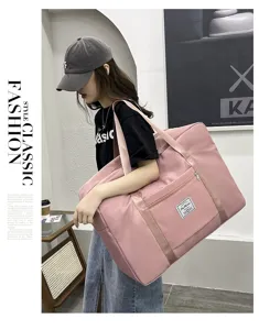 Large capacity pink travel duffel bag waterproof storage bag for clothes and quilts daily use
